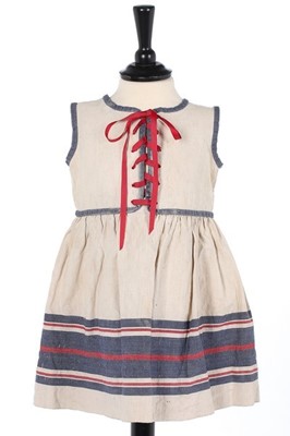 Lot 174 - A rare Paul Poiret child's dress, circa 1922,...