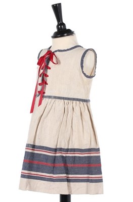 Lot 174 - A rare Paul Poiret child's dress, circa 1922,...
