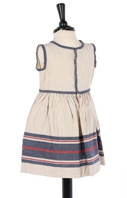 Lot 174 - A rare Paul Poiret child's dress, circa 1922,...
