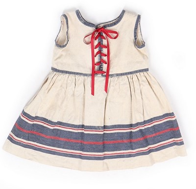 Lot 174 - A rare Paul Poiret child's dress, circa 1922,...