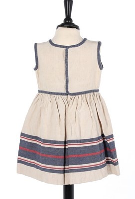 Lot 174 - A rare Paul Poiret child's dress, circa 1922,...
