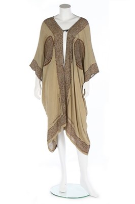 Lot 162 - A Mariano Fortuny stencilled green silk tunic,...
