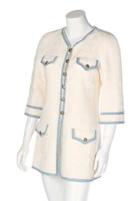 Lot 124 - A Chanel white cotton-tweed jacket, 2007,...