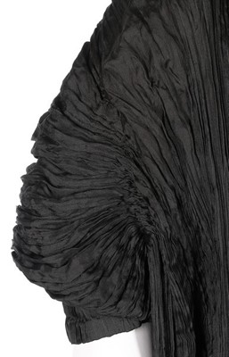 Lot 164 - A Mariano Fortuny black pleated silk Delphos...