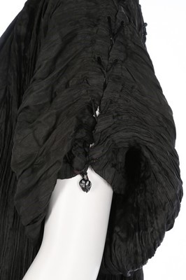 Lot 164 - A Mariano Fortuny black pleated silk Delphos...