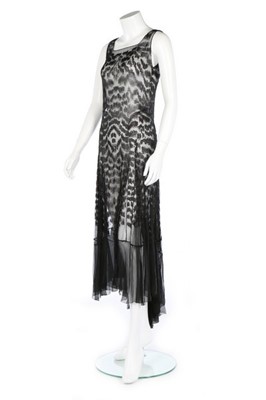 Lot 191 - A black bugle beaded chiffon evening dress,...