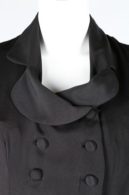 Lot 201 - A Balenciaga black silk crêpe double-breasted...