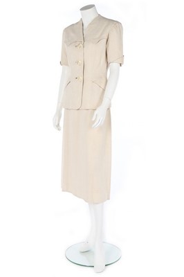 Lot 196 - A rare Hermès white linen summer suit, late...