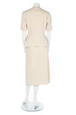 Lot 196 - A rare Hermès white linen summer suit, late...