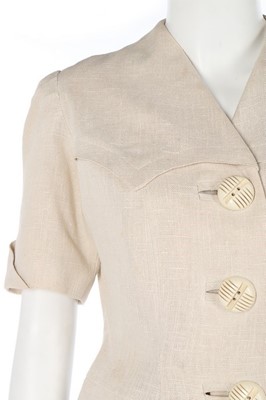 Lot 196 - A rare Hermès white linen summer suit, late...