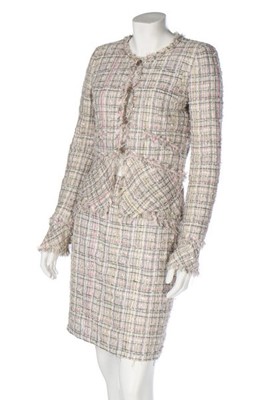 Lot 126 - A Chanel cotton-tweed suit in pastel shades,...