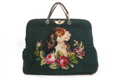 Lot 146 - A Berlin woolworked 'carpet' bag, 1860s