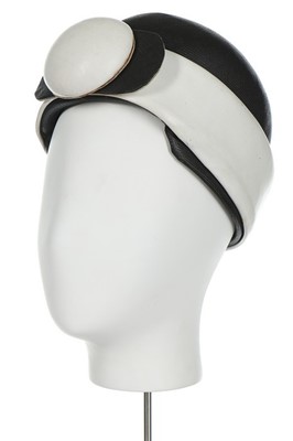 Lot 182 - A Christian Dior futuristic hat, mid 1960s,...