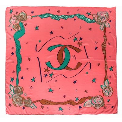 Lot 206 - A large Chanel salmon-pink printed silk scarf,...