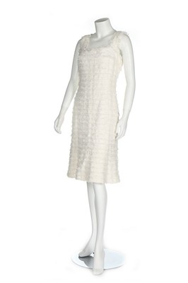 Lot 300 - A Chanel white tweed dress, 2005, labelled and...