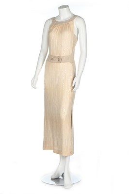 Lot 305 - A Chanel beige tweed evening ensemble, 2001,...