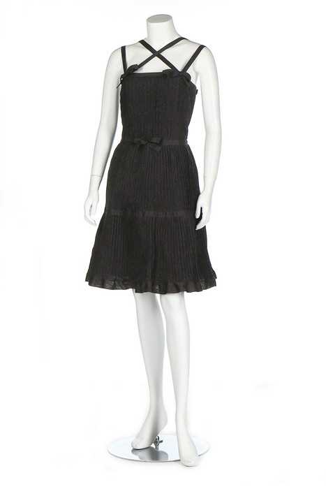 Lot 313 - Two Chanel cocktail dresses, labelled, the...