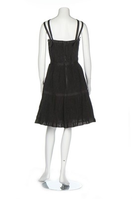 Lot 313 - Two Chanel cocktail dresses, labelled, the...