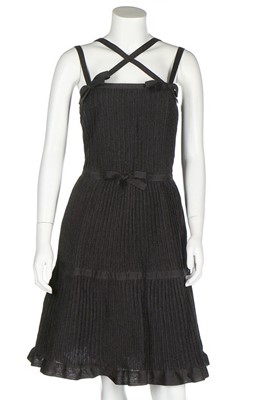 Lot 313 - Two Chanel cocktail dresses, labelled, the...