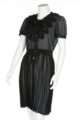 Lot 314 - A Chanel black knitted jersey dress, 2000s,...