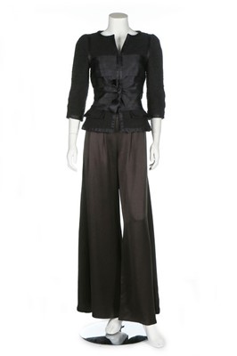 Lot 315 - A Chanel black tweed and satin ensemble, 2006,...