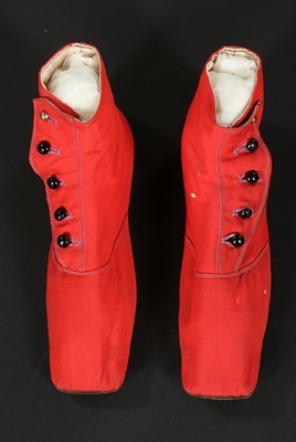 Lot 244 - A pair of chisel-toed scarlet wool ankle boots,...