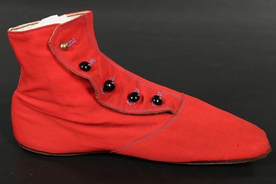 Lot 244 - A pair of chisel-toed scarlet wool ankle boots,...