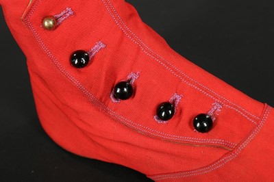 Lot 244 - A pair of chisel-toed scarlet wool ankle boots,...