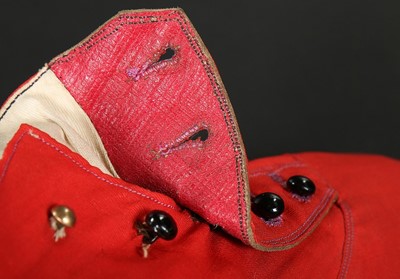 Lot 244 - A pair of chisel-toed scarlet wool ankle boots,...