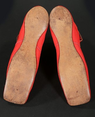 Lot 244 - A pair of chisel-toed scarlet wool ankle boots,...