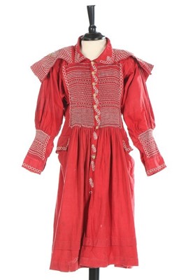 Lot 145 - A child's scarlet linen farmer's smock, circa...