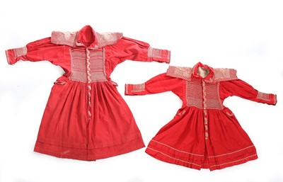 Lot 145 - A child's scarlet linen farmer's smock, circa...