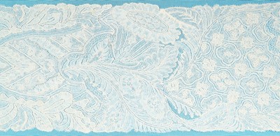 Lot 385 - A Brussels bobbin lace single lappet, 1700-20,...