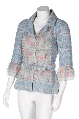 Lot 134 - A Chanel pale blue and pink tweed jacket,...