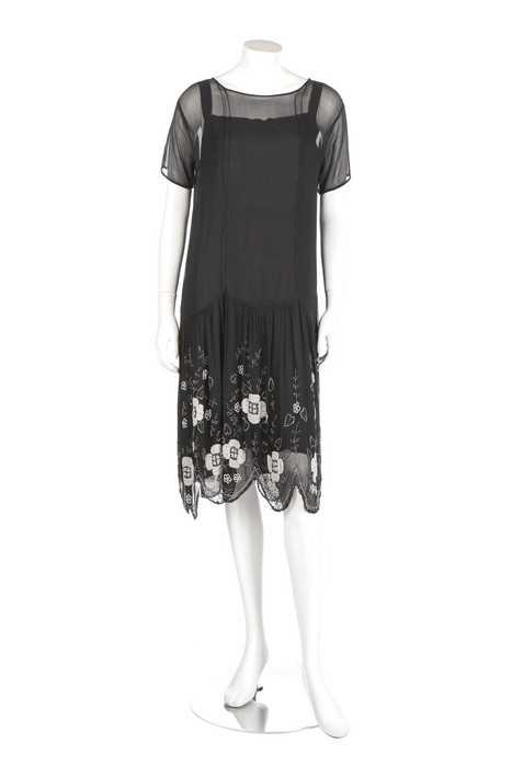 Lot 25 - Two black beaded flapper dresses, late 1920s,...