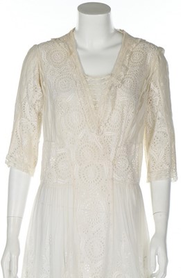 Lot 48 - A whitework muslin dress, early 1920s, with...