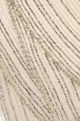 Lot 50 - A couture beaded nude chiffon flapper dress,