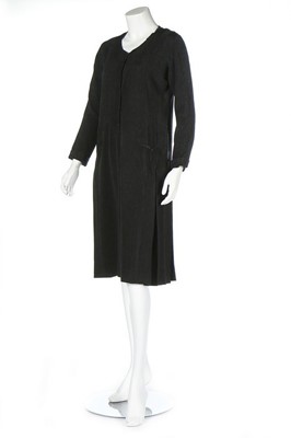 Lot 216 - A rare and early Lucien Lelong couture black...