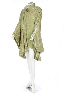 Lot 289 - A Lucien Lelong crushed pale green velvet...