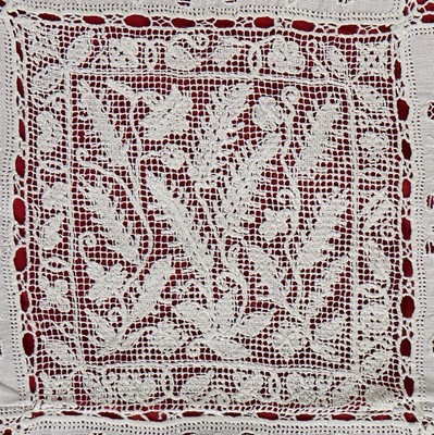 Lot 387 - A fine lacis, reticella and cutwork cover,...