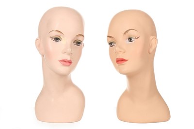 Lot 268 - Four plaster ladies display heads, 1950s, with...