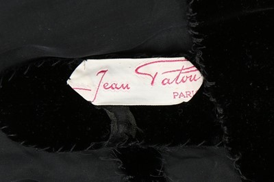 Lot 8 - A Jean Patou couture beaded black velvet...