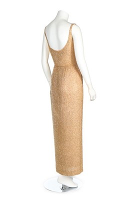 Lot 64 - A Douglas Darnell gold beaded evening ensemble,...