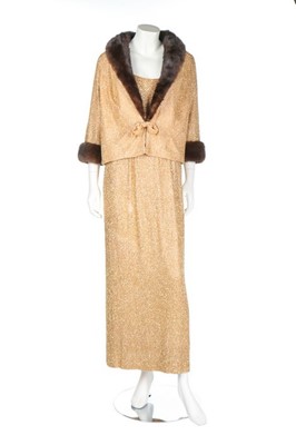 Lot 64 - A Douglas Darnell gold beaded evening ensemble,...