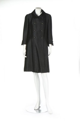 Lot 215 - A Chanel couture black mohair coat, circa 1963,...