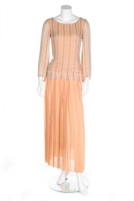 Lot 204 - A Chanel couture beaded pale peach chiffon...