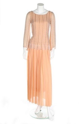 Lot 66 - A Chanel couture beaded pale peach chiffon...