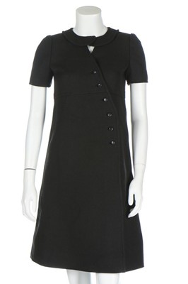 Lot 173 - A Courrèges black wool dress, circa 1970,...