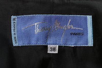 Lot 32 - A Thierry Mugler blue wool and satin suit,...
