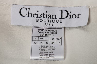 Lot 34 - A Christian Dior Boutique hot-pink wool suit,...